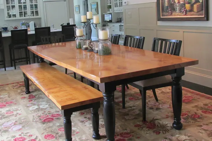 Dining room with table and bench seating.