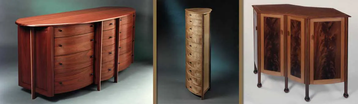 Three wooden chests with unique designs.